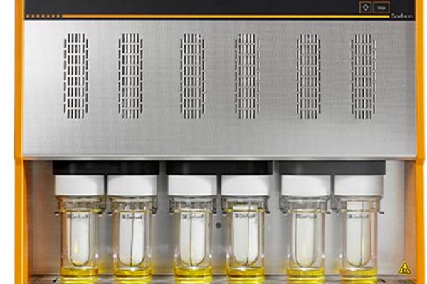 A Hua Env thimble next to a Whatman thimble showing comparable quality