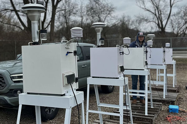 Continuous particulate monitor filter tape system showcasing automated sampling technology for real-time air quality measurement and analysis
