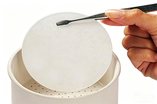 Efficient wastewater filtering system using glass microfiber filters for environmental monitoring and particle retention applications