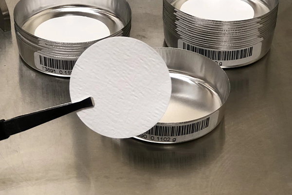 HuaEnv glass microfiber filter showcasing pure borosilicate glass fiber composition without binders or additives for chemically inert and interference-free analytical filtration